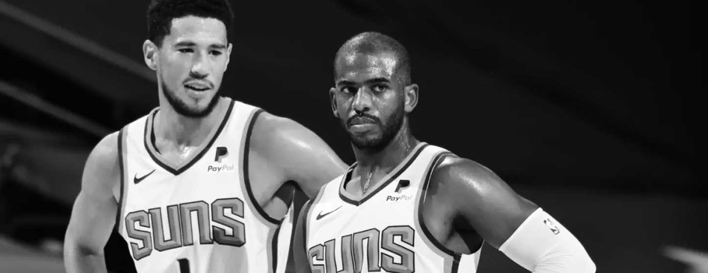 NBA: Devin Booker reage a lesão que vai afastar Chris Paul do Suns