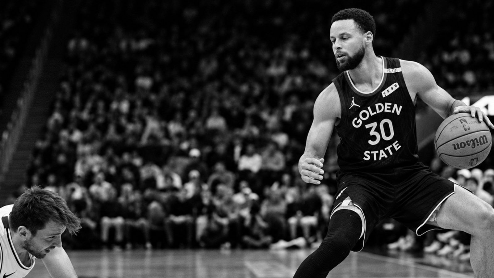 Curry dá aula de basquete para Doncic em vitória do Warriors